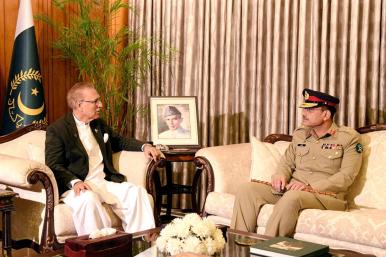 Lieutenant General Asim Munir, newly appointed as the new Chief Of Army Staff of Pakistan, meets with President Arif Alvi in Islamabad - source: Reuters